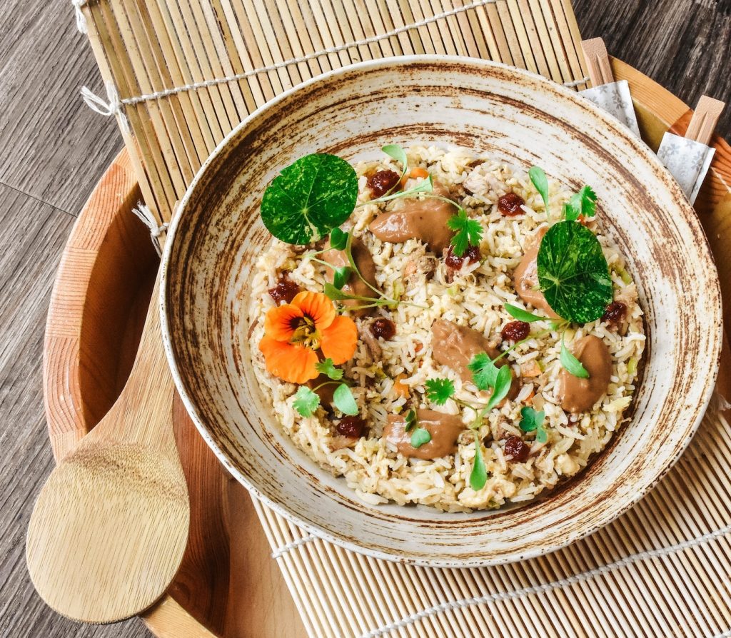 brown wooden bowl with food Photo by Laura